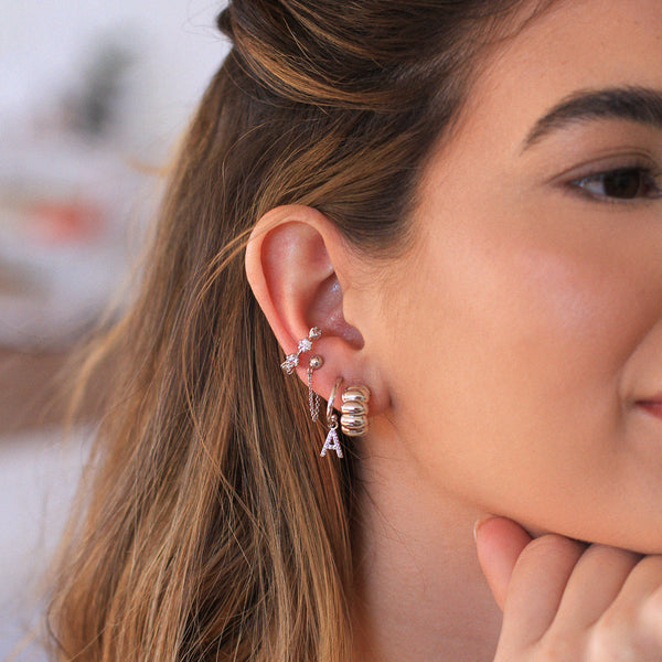 Piercing Melina Prata