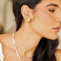 Piercing Ana Dourado
