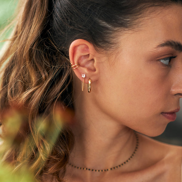 Piercing Astra Dourado