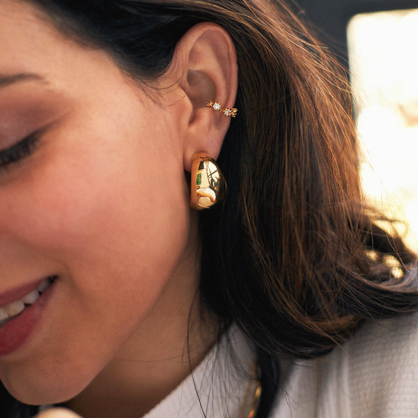 Piercing Melina Dourado