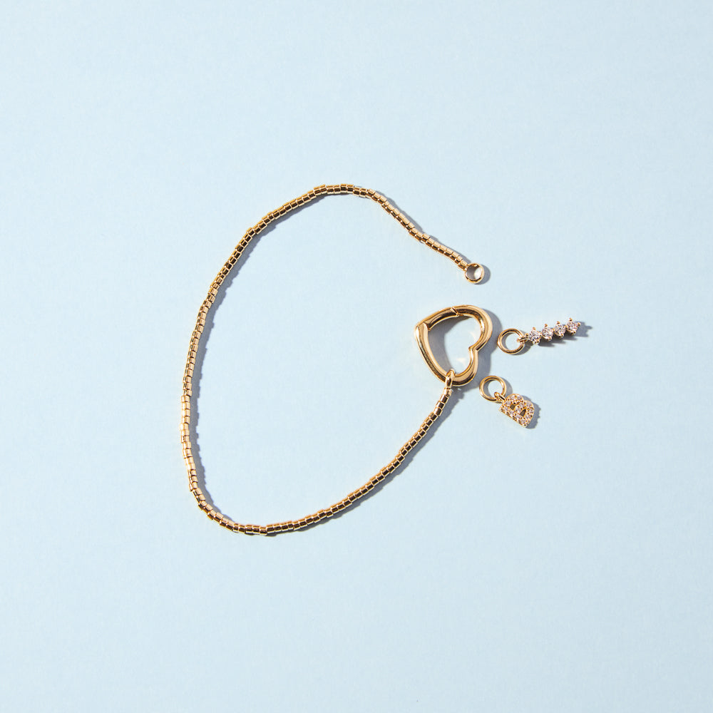 Charm Inicial Dourado